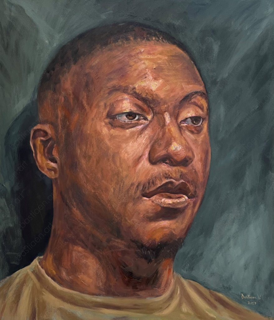 Oil portrait painting (60 × 70 cm) by Bastiaen Vries. A man with dark skin, short hair, and a natural-colored T-shirt gazes to the side. His well-defined lips stand out. Painted after a live model session and further refined into a detailed final piece.